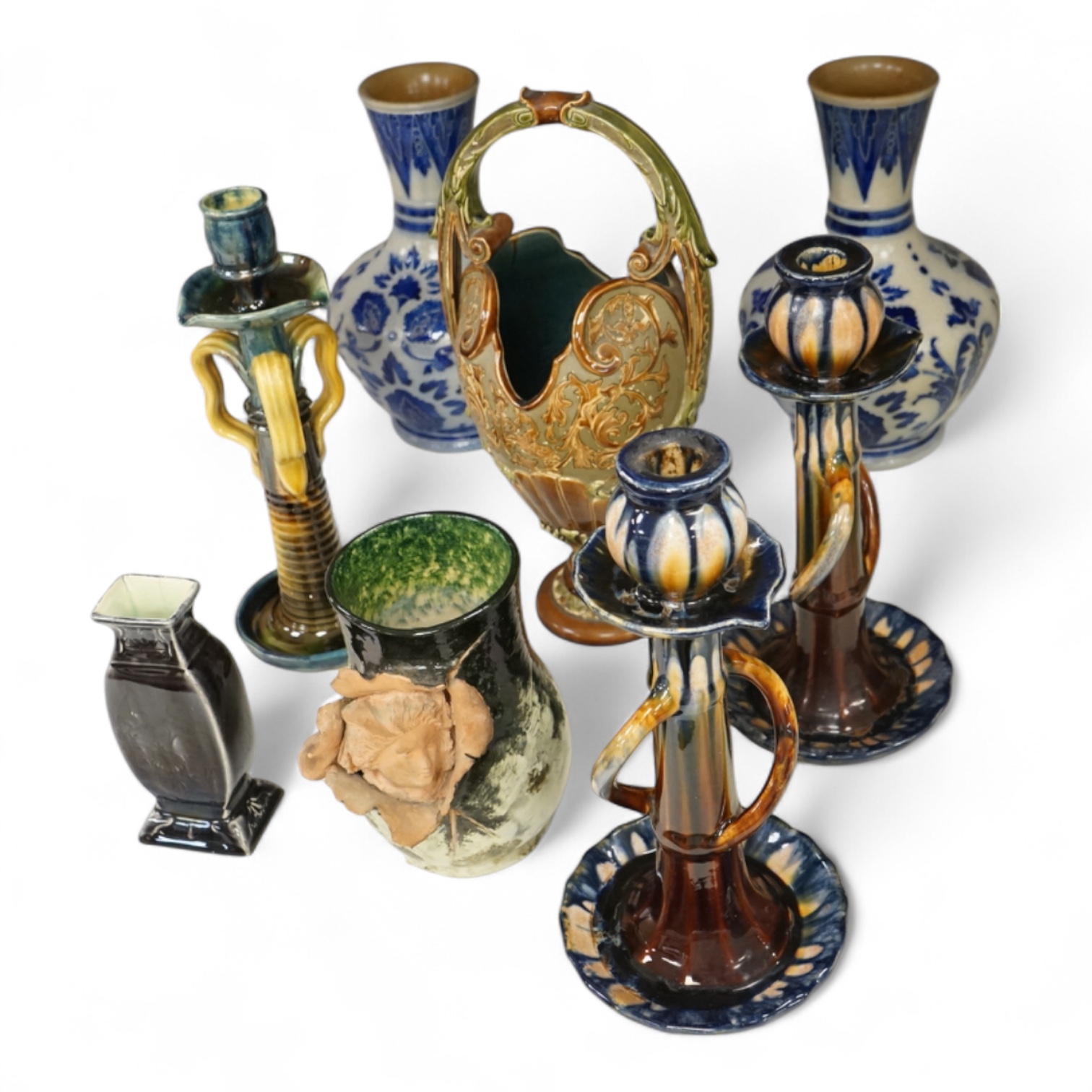 A collection of late 19th century and early 20th century European pottery and stoneware items to include a pair of glazed candlesticks stamped Belgium, largest 36cm high
